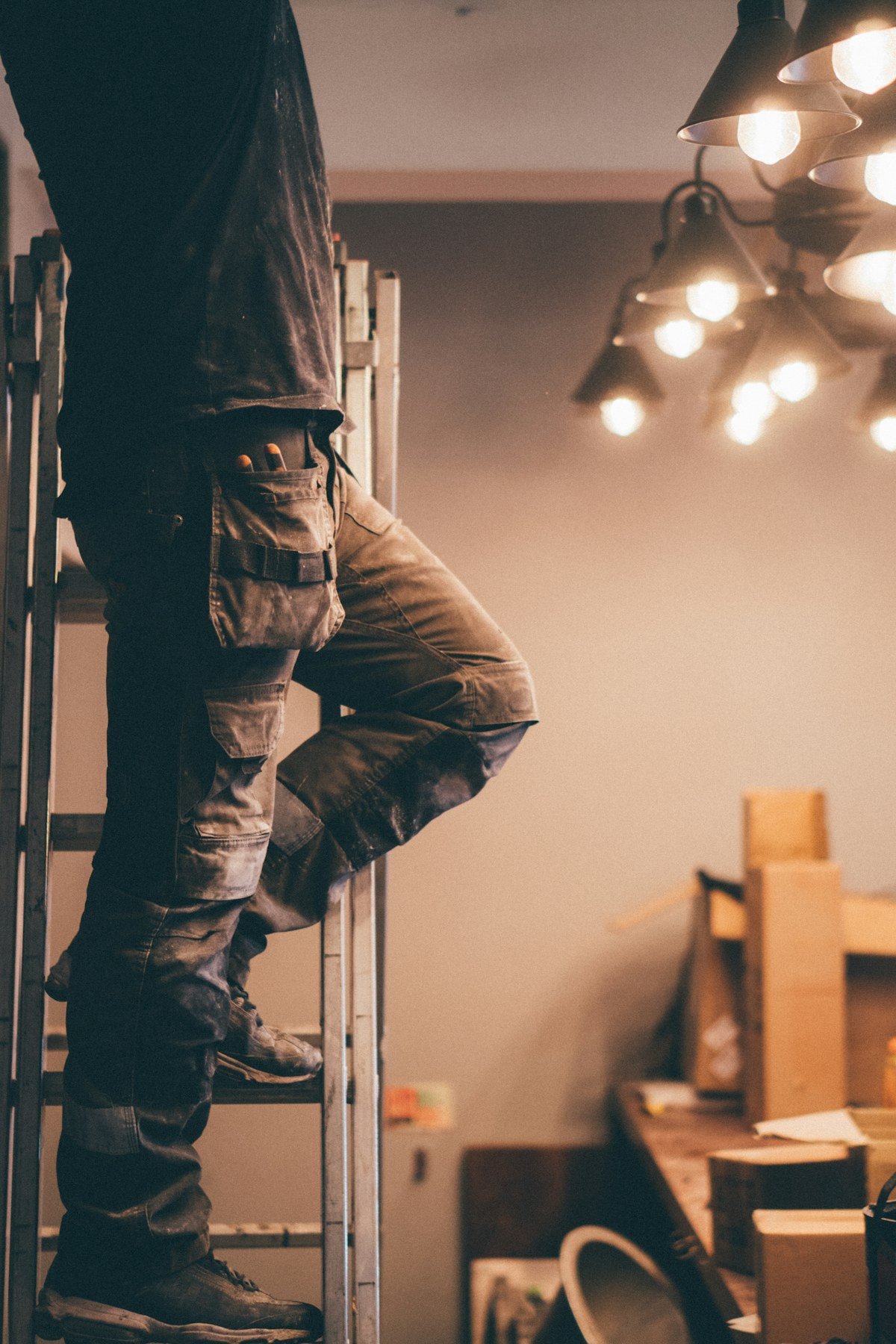 Interior light fitting work — illustrative stock photograph
